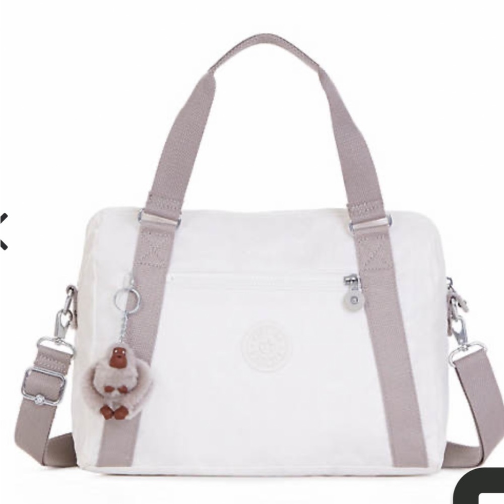 Beautiful Kipling purse in Lacquer pearl color. New with tags!
